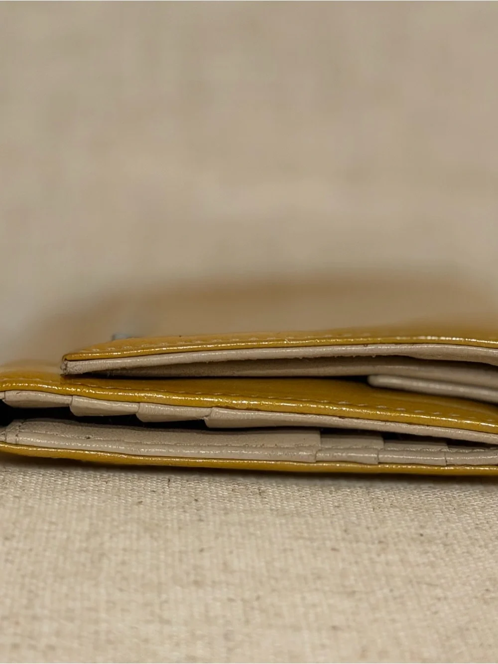 Prada Glossy Mustard Patent Leather Wallet with Silver Logo Bar